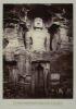 Photograph captioned 'Gwalior Fortress—Buddhist Colossal Figure, 62 Feet High'